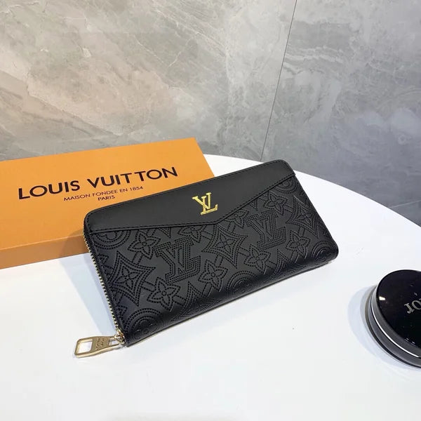 Louis Vuitton Wallet Made of Leather Embossed with the Brand's Logo