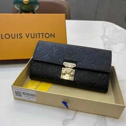 Louis Vuitton Slender Wallet – Monogram Seal Embossed Cowhide