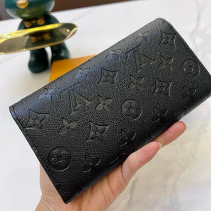 Louis Vuitton Slender Wallet – Monogram Seal Embossed Cowhide