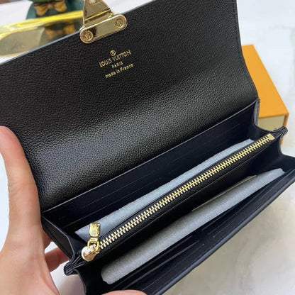 Louis Vuitton Slender Wallet – Monogram Seal Embossed Cowhide