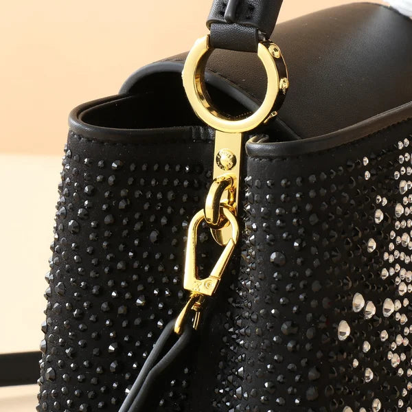 Louis Vuitton Bag is Made of Genuine Leather and Decorated with Diamonds
