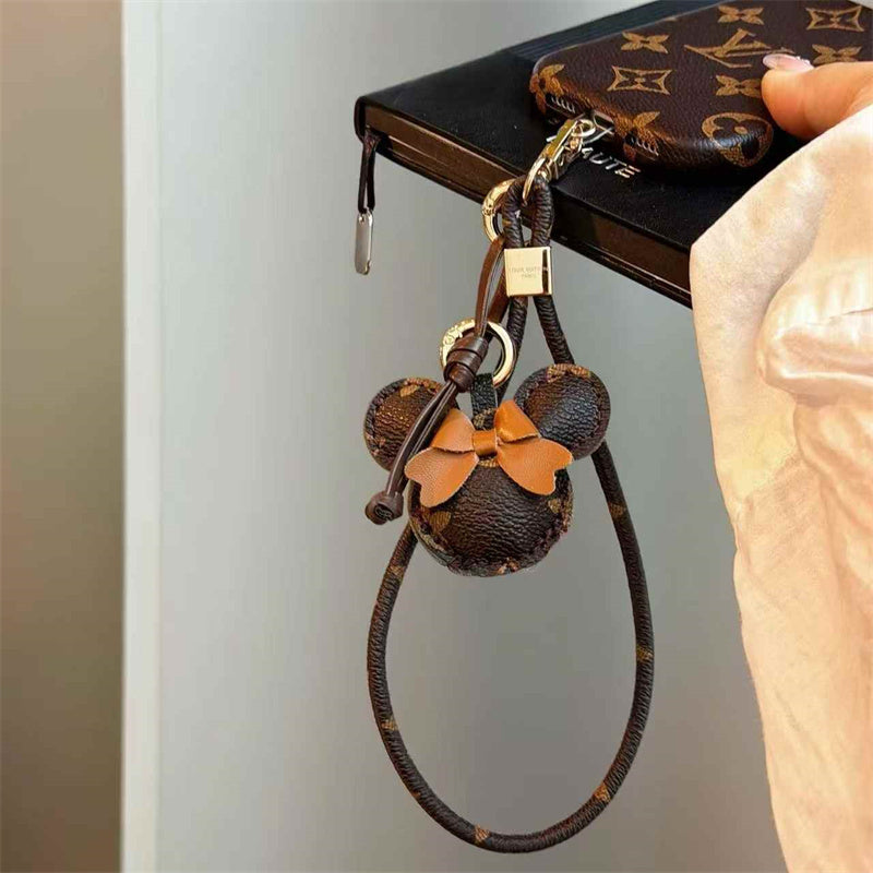 Luxury Monogram Case with Bow Charm & Wrist Lanyard