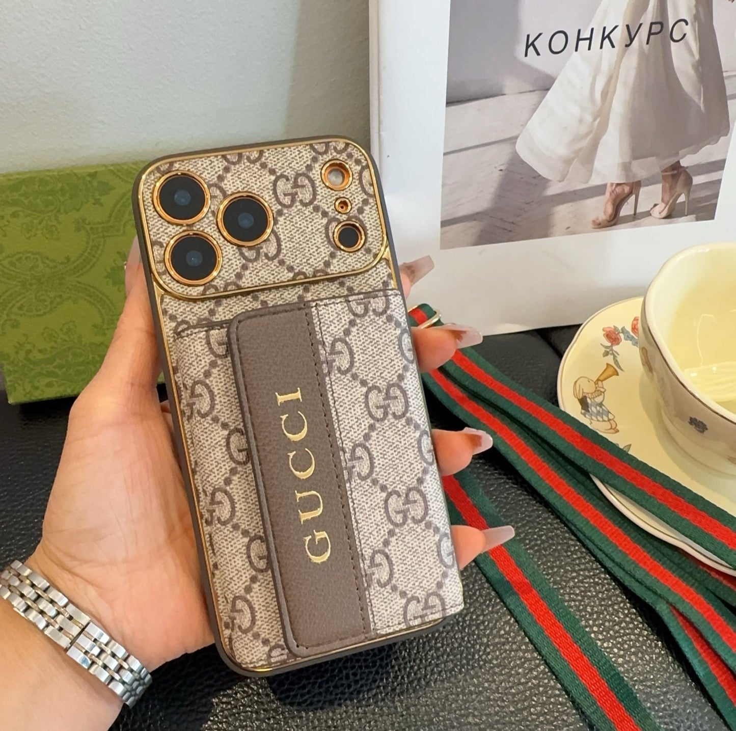 Classic Gucci monogram phone case with card slot & crossbody lanyard