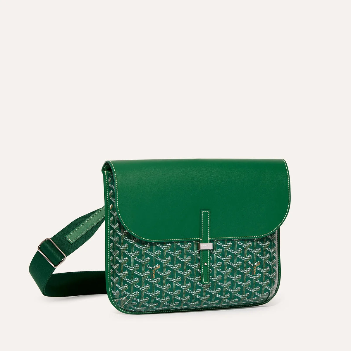 Luxury Goyardine canvas messenger bag in green with green leather flap