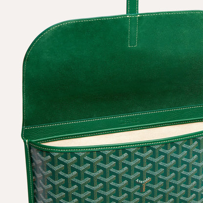 Inside open compartment view of luxury Goyardine canvas messenger bag in green